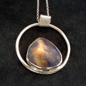 Blue stone in ring necklace