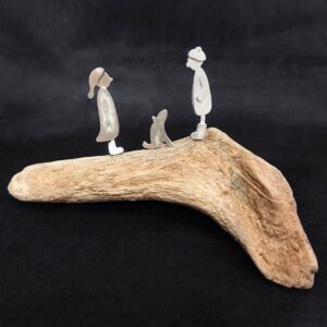 People on Driftwood - Couple with Dog
